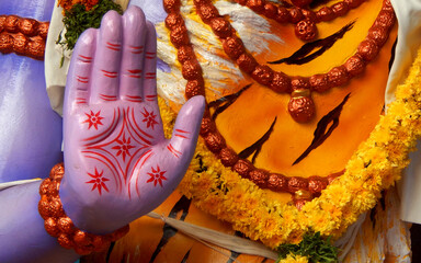 Hand of Hindu god Shiva statue in blessing pose