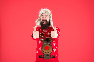 Christmas sweater. Hipster bearded man wear christmas jumper and hat. Extra comfy wool look. Christmas tradition. Christmas spirit and vibe. Happy new year. Join party. Winter outfit - Powered by Adobe
