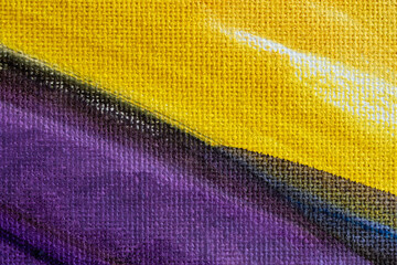 Abstract yellow lilac background with oil paint on canvas. Handmade textured background for signage and banners. A picturesque fragment of a picture of lavender and wheat. Mixing oil paints on canvas.