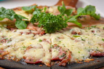Closeup melted cheese on delicious pizza
