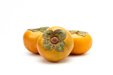 Closeup persimmons isolated on a white background