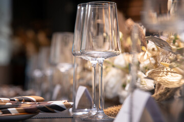empty wine glasses set up on table