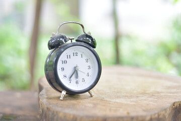 Vintage clock on blur background.