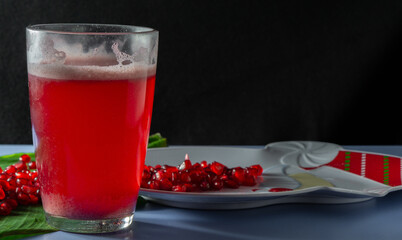 Colorful Pomegranate fruits and juice