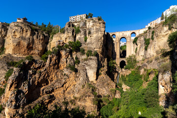 Fototapeta na wymiar The famous Puente Nuevo over the gorge El Tajo in Ronda, one of the famous white towns of Andalusia, Spain.