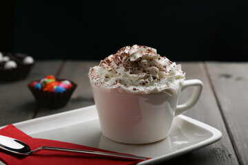 Coffee Con Panna with whipped cream and cacao horizontal view