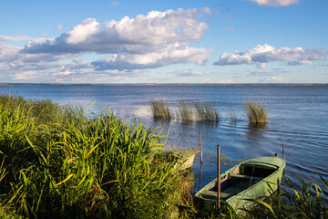 Landscape. Boat at the lake shore