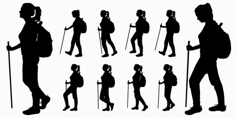 A tourist with a backpack on her back and a walking stick in her hand. The girl walks. Woman on the move. Hiking. Side view, profile. Black female silhouettes isolated on white background.