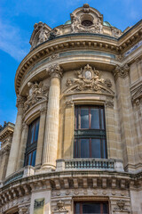 Fototapeta na wymiar Architectural details of Opera National de Paris - Grand Opera (Garnier Palace) is famous neo-baroque building in Paris, France.