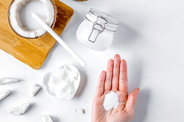 organic cosmetics with coconut on white background top view mockup