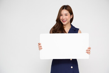 Fototapeta premium Young asian woman showing and holding blank white billboard isolated on white background