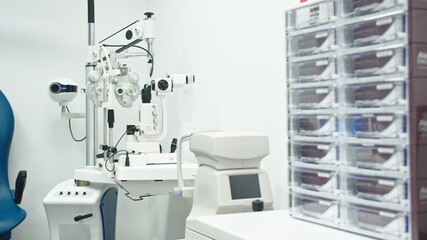 Eye clinic with autorefractor , slit lamp and eye diagnostic tools. High quality photo