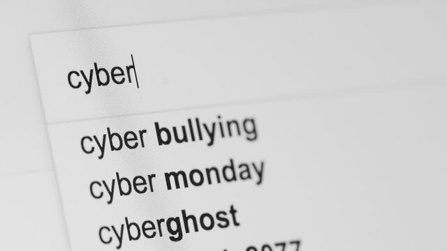 Generic internet search bar looking for the search term 'CYBERBULLYING' shot close up at an angle.