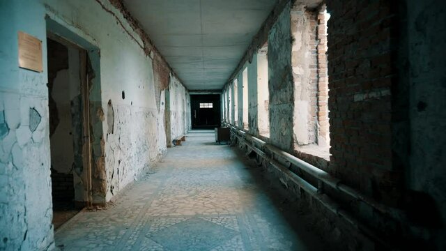 Destroyed school in Beslan after the terrorist attack. Old empty school corridors