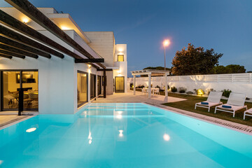 Modern house with garden swimming pool and wooden pergula - obrazy, fototapety, plakaty