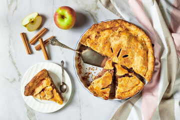 Apple pie on a white marble background