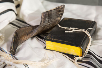shofar, hebrew book and tallit