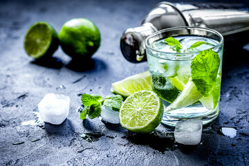 mojito in glass on dark background close up