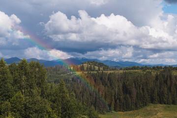 rainbow in mountains