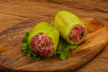 Raw stuffed pepper for cooking