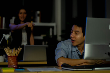 business man working overtime in late night in the office new normal