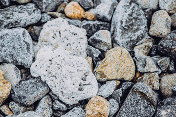 Small and big smooth round pebbles, sea dry stones, multicolour gray gravel. Abstract Composition Textured background. Ideal for web banner design