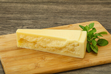 Hard parmesan cheese served basil