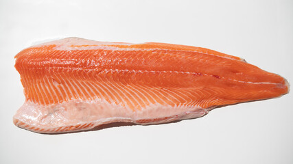 
Fillet of salmon with orange flesh, on white background