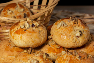 Delicious fried cookies on a straw floor in the basket