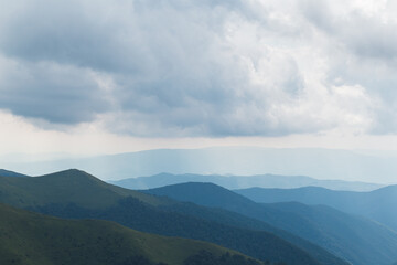scenic clouds in beautiful mountains in summer day