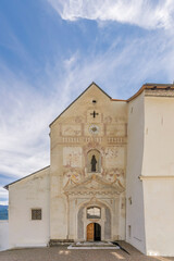 Facade of the ancient Benedictine Abbey of Monte Maria (Abtei Marienberg), Burgusio, Malles, South Tyrol, Italy