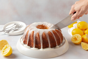 slicing lemon on a board