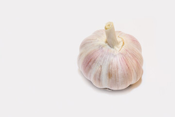 fresh and healthy garlic kept on white background