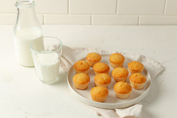 glass of milk and cookies on wooden table