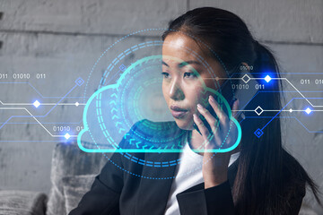Businesswoman speaks phone and cloud storage technology hologram. Double exposure. Internet server concept.