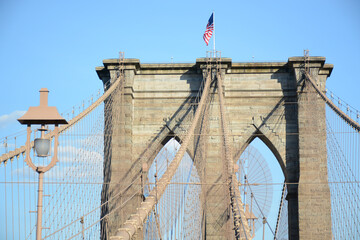 Fototapeta premium New York, NY, USA - June 3, 2019: Brooklyn Bridge connects Manhattan and Brooklyn