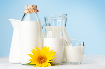 Milk in glass, bottle and jug