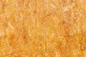 pressed wooden panel background, seamless texture of oriented strand board - OSB wood