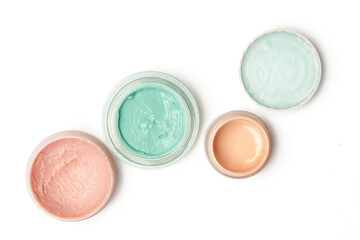 Set of make up and cosmetic products - top view of decorative cosmetic containers isolated on white backgroiunds