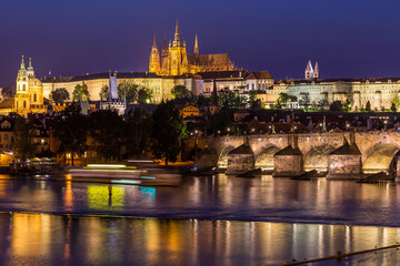 Fototapeta na wymiar Charles Bridge and St. Vitus Cathedral in Prague at night, Czech Republic