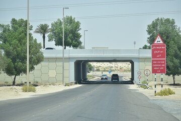 High voltage sign board near tunnel in Abu Dhabi,UAE.21.09.2020.