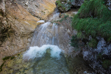 soft thin waterfall over rocks