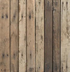 brown vertical old wood planks with nails