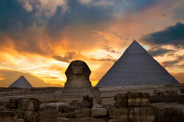 Fototapeta na wymiar Sunset at the the Pyramid complex at Giza, Egypt.