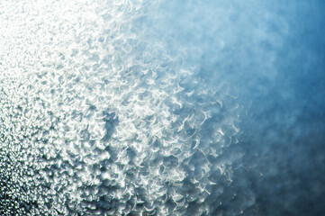 Abstract blurred glow sparkle bokeh background with glitter lights.