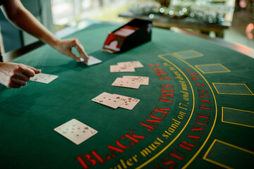  the dealer distributes chips in the casino - obrazy, fototapety, plakaty