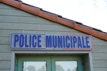 french police municipale sign on outdoor office building wooden wall