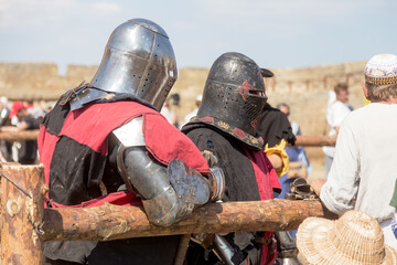 ODESSA, UKRAINE - JULY 20, 2019: Battle of the Knights with medieval weapons at the medieval...