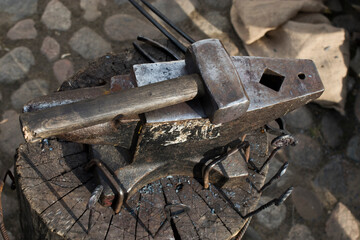 Blacksmith tools - the hammer lies on the anvil