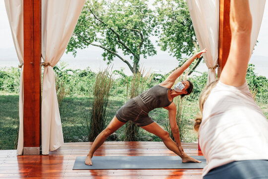 Yoga Instructor Wearing Face Mask During Outdoors Class